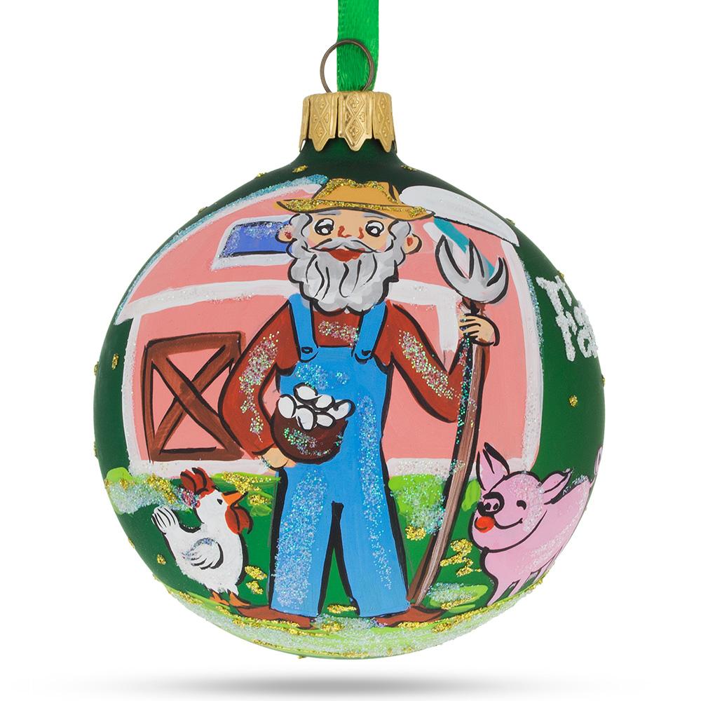 Countryside Charm: Farmer by the Barn Blown Glass Ball Christmas Ornament 3.25 Inches in Green color, Round shape