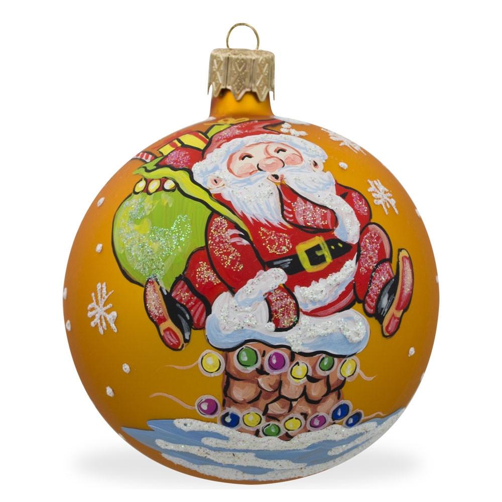 Jolly Santa Climbing Chimney with Gifts Blown Glass Ball Christmas Ornament 3.25 Inches in Orange color, Round shape