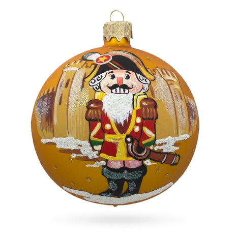 Guardian of Festivities: Nutcracker Soldier Blown Glass Ball Christmas Ornament 3.25 Inches in Orange color, Round shape