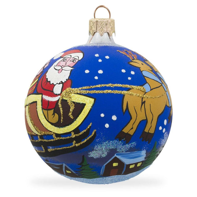 Moonlit Journey: Santa Riding Sleigh Blown Glass Ball Christmas Ornament 3.25 Inches in Blue color, Round shape