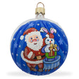 Enchanted Evening: Santa's Magical Rabbit Trick Blown Glass Ball Christmas Ornament 3.25 Inches in Blue color, Round shape