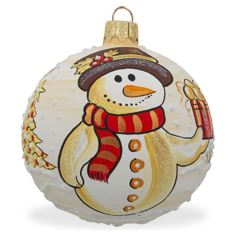 Cheerful Giver: Snowman Holding Gift Blown Glass Ball Christmas Ornament 3.25 Inches in Multi color, Round shape