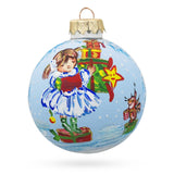 Little Girl Holding Gifts Glass Ball Christmas Ornament 3.25 Inches in Blue color Round