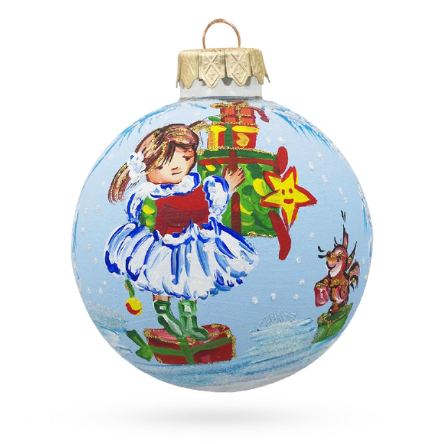 Little Girl Holding Gifts Glass Ball Christmas Ornament 3.25 Inches in Blue color Round