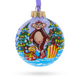 Monkey with Christmas Tree and Gifts Glass Ball Christmas Ornament 3.25 Inches in Multi color Round