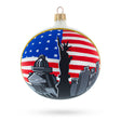 Patriotic Landmark: Statue of Liberty with USA Flag, New York City Blown Glass Ball Christmas Ornament 4 Inches in White color, Round shape