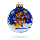 Bear Skiing with Snowman and USA Flag Glass Ball Christmas Ornament 3.25 Inches in Blue color Round