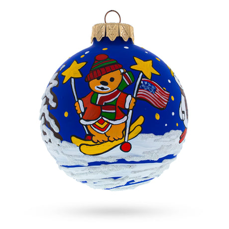 Glass Patriotic Winter Adventure: Bear Skiing with Snowman and USA Flag Blown Glass Ball Christmas Ornament 3.25 Inches in Blue color Round