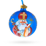 St. Nicholas Reviewing His Gift List Glass Ball Christmas Ornament 3.25 Inches in Blue color Round