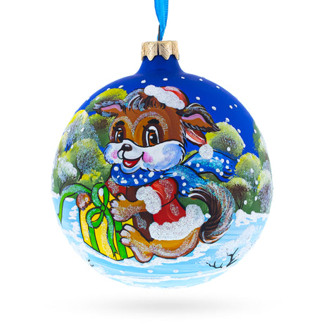 Puppy Unwrapping a Surprise Glass Ball Christmas Ornament 4 Inches in Blue color Round