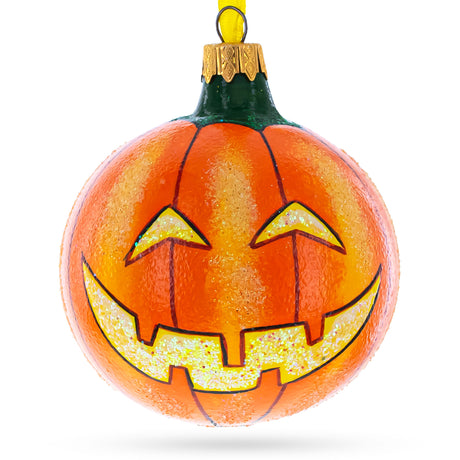 Glowing Spirit: Jack-o'-lantern Glass Ball Halloween Ornament 3.25 Inches in Orange color, Round shape