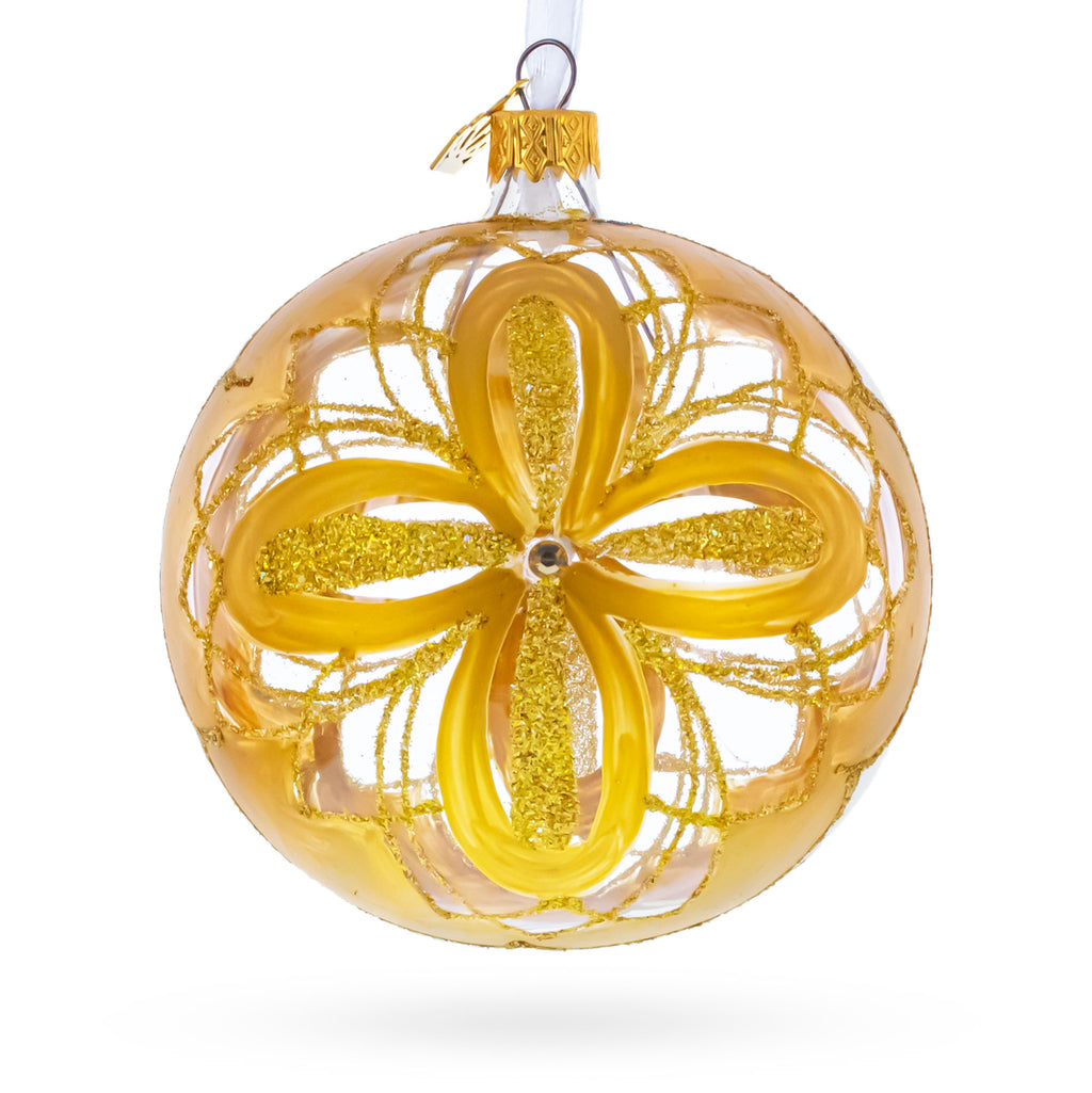 Radiant Gold Starburst Pattern Glass Ball Christmas Ornament 4 Inches in Gold color Round