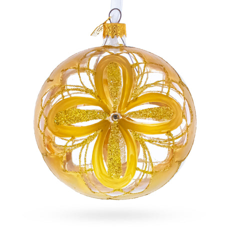 Radiant Gold Starburst Pattern Glass Ball Christmas Ornament 4 Inches in Gold color Round