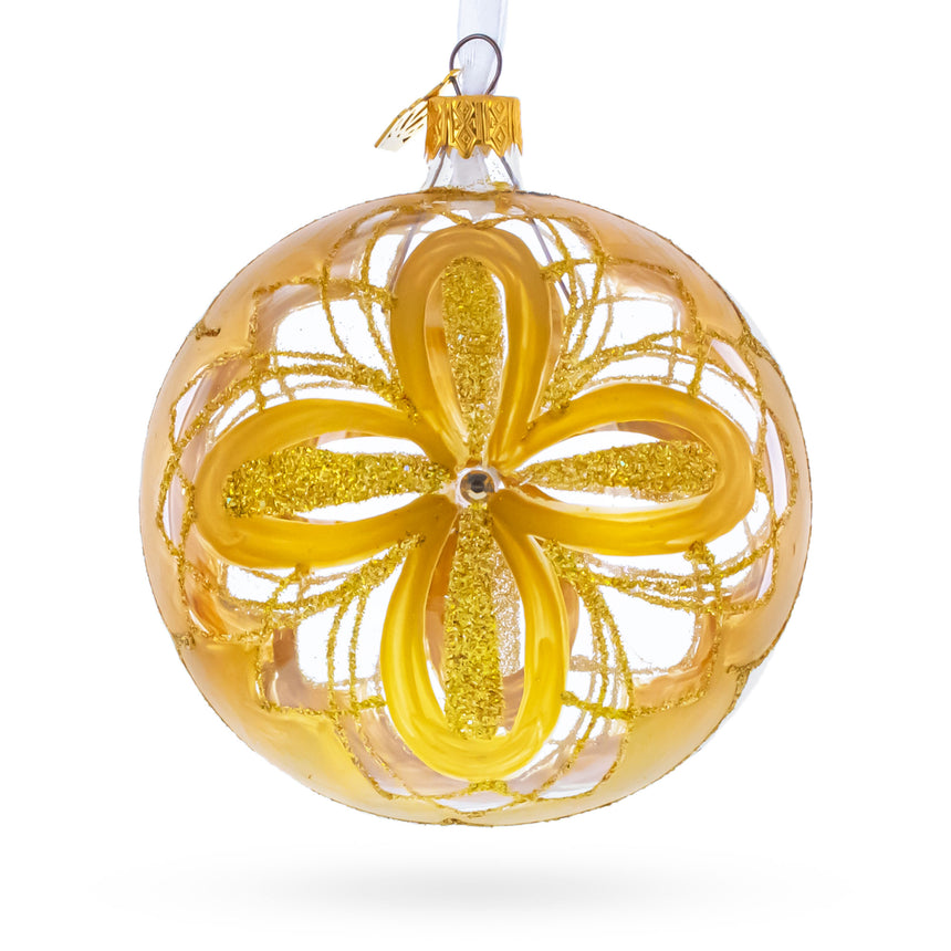 Radiant Gold Starburst Pattern Glass Ball Christmas Ornament 4 Inches in Gold color Round