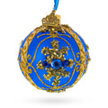 Gold Glitter Scrolls and Blue Gem Snowflake on Royal Blue Glass Ball Christmas Ornament in Blue color Round