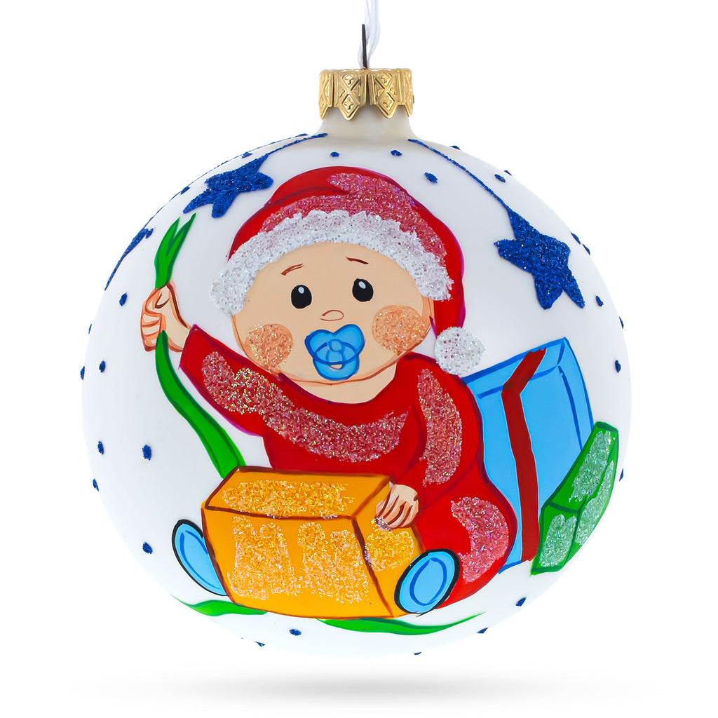 Boy Opening Gift Glass Ball Baby's First Christmas Ornament 4 Inches in Multi color Round