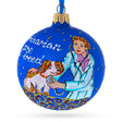 Compassionate Veterinarian Checking Dog - Blown Glass Ball Christmas Ornament 3.25 Inches in Blue color, Round shape