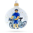 Glass Pedaling Joy Bicycle Rider Blown Glass Ball Christmas Ornament 3.25 Inches in White color Round