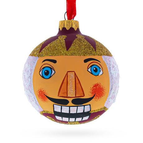 Nutcracker Face Blown Glass Christmas Ornament 3.25 Inches in Multi color Round