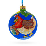 Hen Decorating the Tree Blown Glass Christmas Ornament 3.25 Inches in Multi color Round