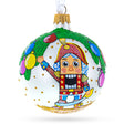 Yuletide Elegance: Nutcracker and Christmas Tree Blown Glass Ball Ornament 3.25 Inches in Multi color, Round shape