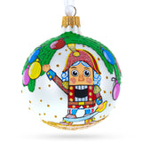 Nutcracker and Christmas Tree Blown Glass Ball Ornament 3.25 Inches in Multi color Round