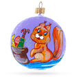 Delighted Squirrel Presenting Gifts Beside a Festive Tree Blown Glass Ball Christmas Ornament 3.25 Inches in Purple color, Round shape