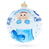 Boy Snuggled in a Christmas Stocking  Baby's First Christmas Ball Ornament 4 Inches in White color Round