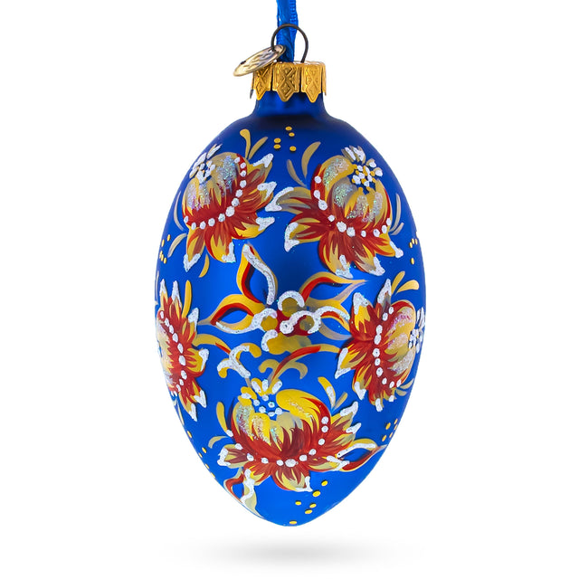 Golden Blue Floral Glass Egg Ornament 4 Inches in Blue color, Oval shape