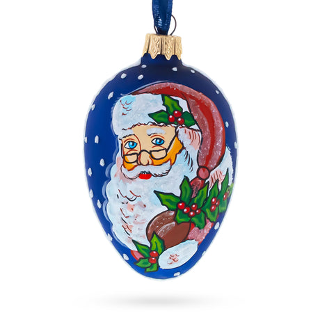 Santa With Mistletoe Glass Egg Ornament 4 Inches in Blue color Oval