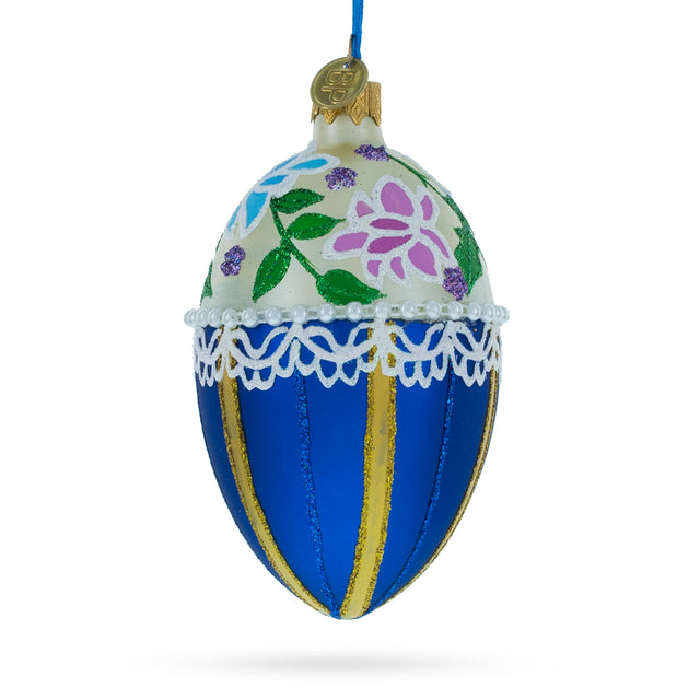 Flowers on Beige and Blue Glass Egg Christmas Ornament 4 Inches in Blue color, Oval shape