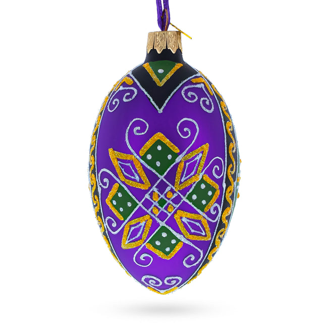 Purple Geometric Ukrainian Pysanka Egg Glass Christmas Ornament 4 Inches in Purple color, Oval shape