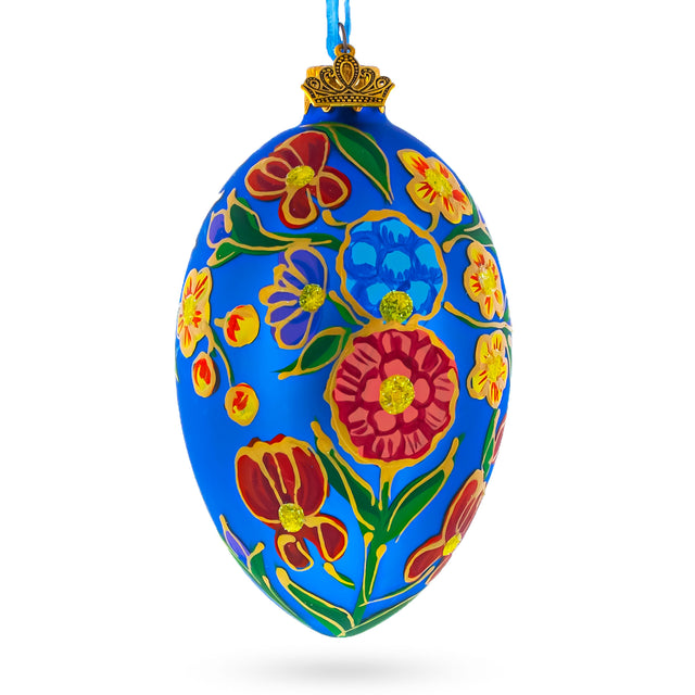 Colorful Flowers on Blue Glass Egg Ornament 4 Inches in Blue color, Oval shape