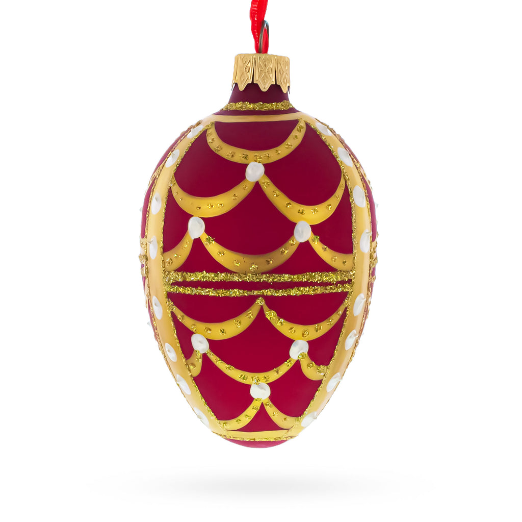Gold Arches On Red Egg Glass Ornament 4 Inches in Red color Oval