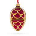 Gold Arches On Red Egg Glass Ornament 4 Inches in Red color Oval