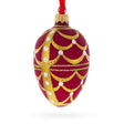 Gold Arches On Red Egg Glass Ornament 4 Inches in Red color, Oval shape