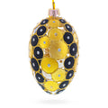 Gold and Black Circles Glass Egg Christmas Ornament 4 Inches in Gold color Oval
