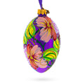 Flowers on Purple Glass Egg Ornament 4 Inches in Purple color Oval