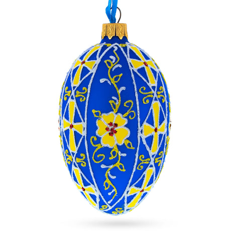 Sunlit Blossoms: Blue with Yellow Floral Design Glass Egg Ornament 4 Inches in Blue color, Oval shape
