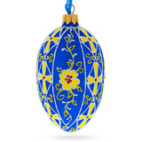 Glass Sunlit Blossoms: Blue with Yellow Floral Design Glass Egg Ornament 4 Inches in Blue color Oval