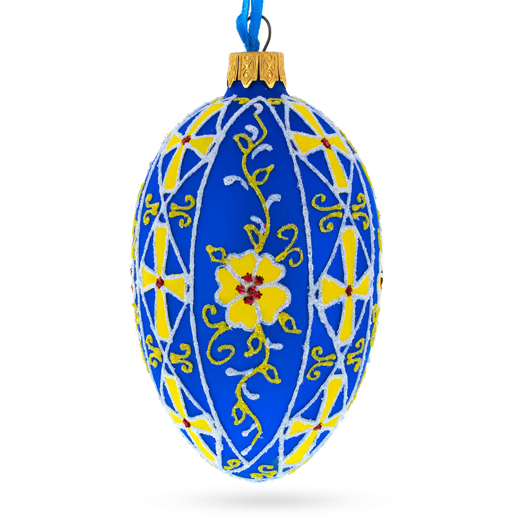 Blue with Yellow Floral Design Glass Egg Ornament 4 Inches in Blue color Oval