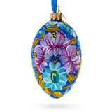 Multi Color Flowers Glass Egg Ornament 4 Inches in Blue color, Oval shape