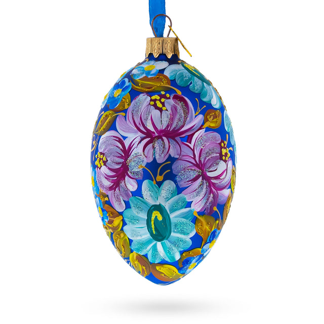 Multi Color Flowers Glass Egg Ornament 4 Inches in Blue color, Oval shape
