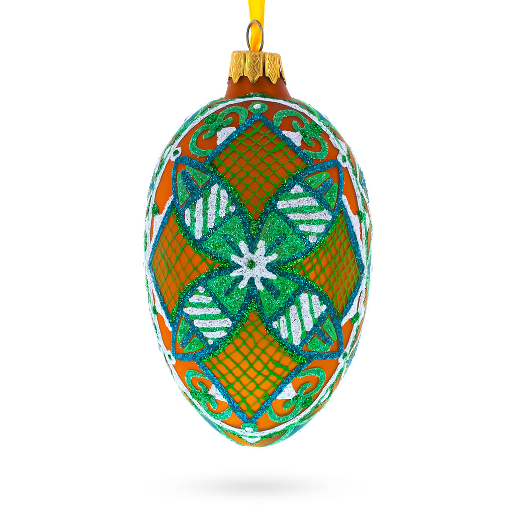 The Green Star Ukrainian Pysanka Glass Egg Ornament 4 Inches in Green color Oval