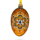 White Flower On Orange Glass Egg Ornament 4 Inches in Gold color Oval
