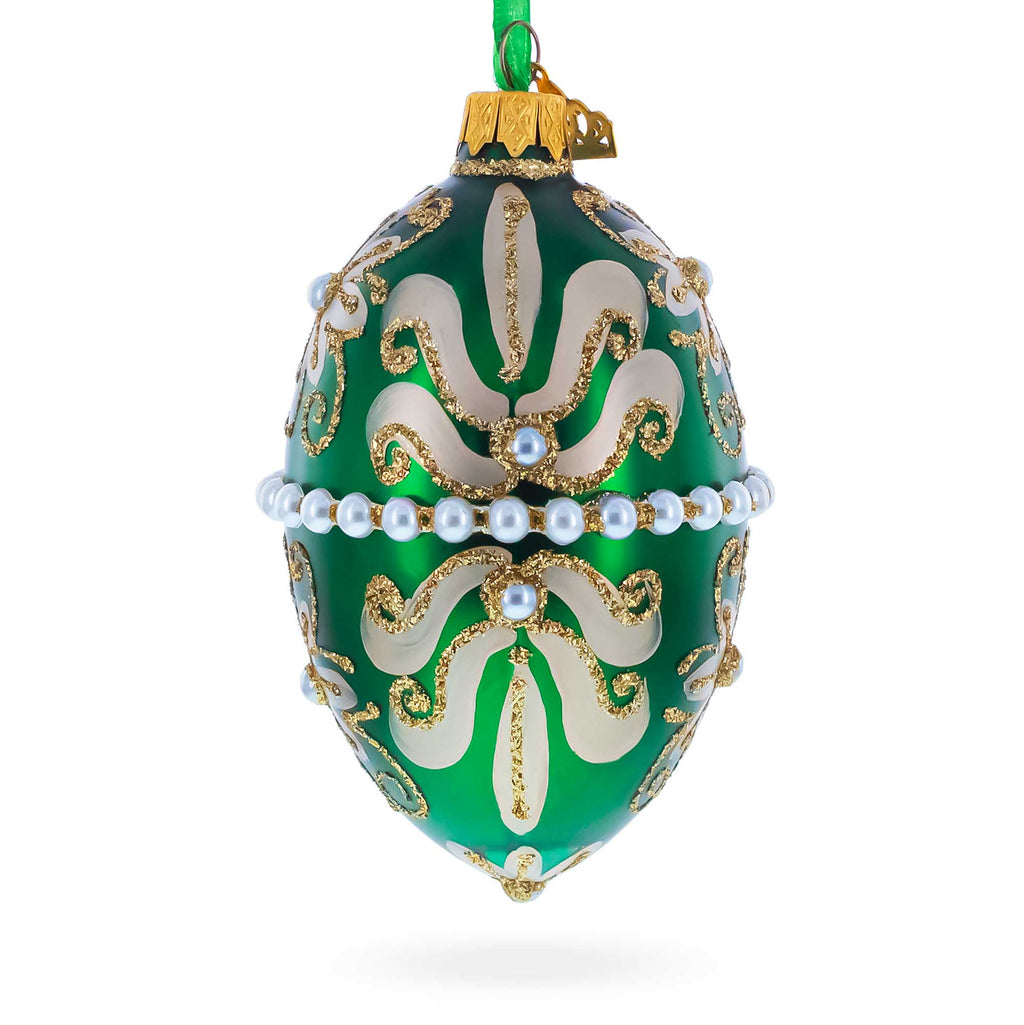 Beaded Center & Golden Flowers On Green Glass Egg Ornament 4 Inches in Green color Oval