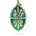 Beaded Center & Golden Flowers On Green Glass Egg Ornament 4 Inches in Green color Oval