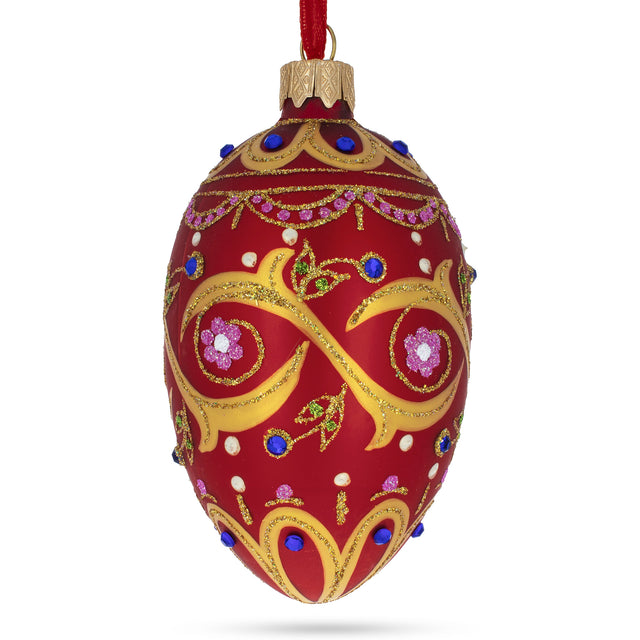 Glass Blue Jewels On Red Glass Egg Ornament 4 Inches in Red color Oval
