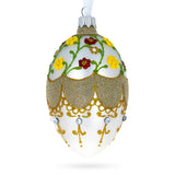 Multicolor Flowers On White Glass Egg Ornament 4 Inches in Gold color, Oval shape