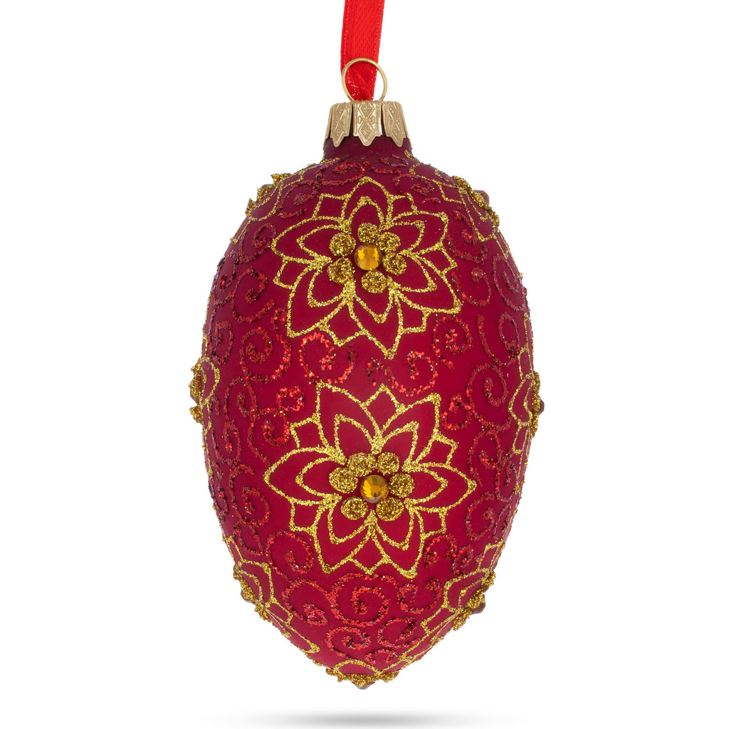 Golden Flower on Red Glass Egg Ornament 4 Inches in Red color Oval